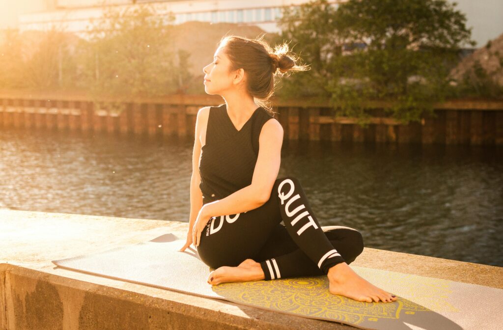 woman performs yoga